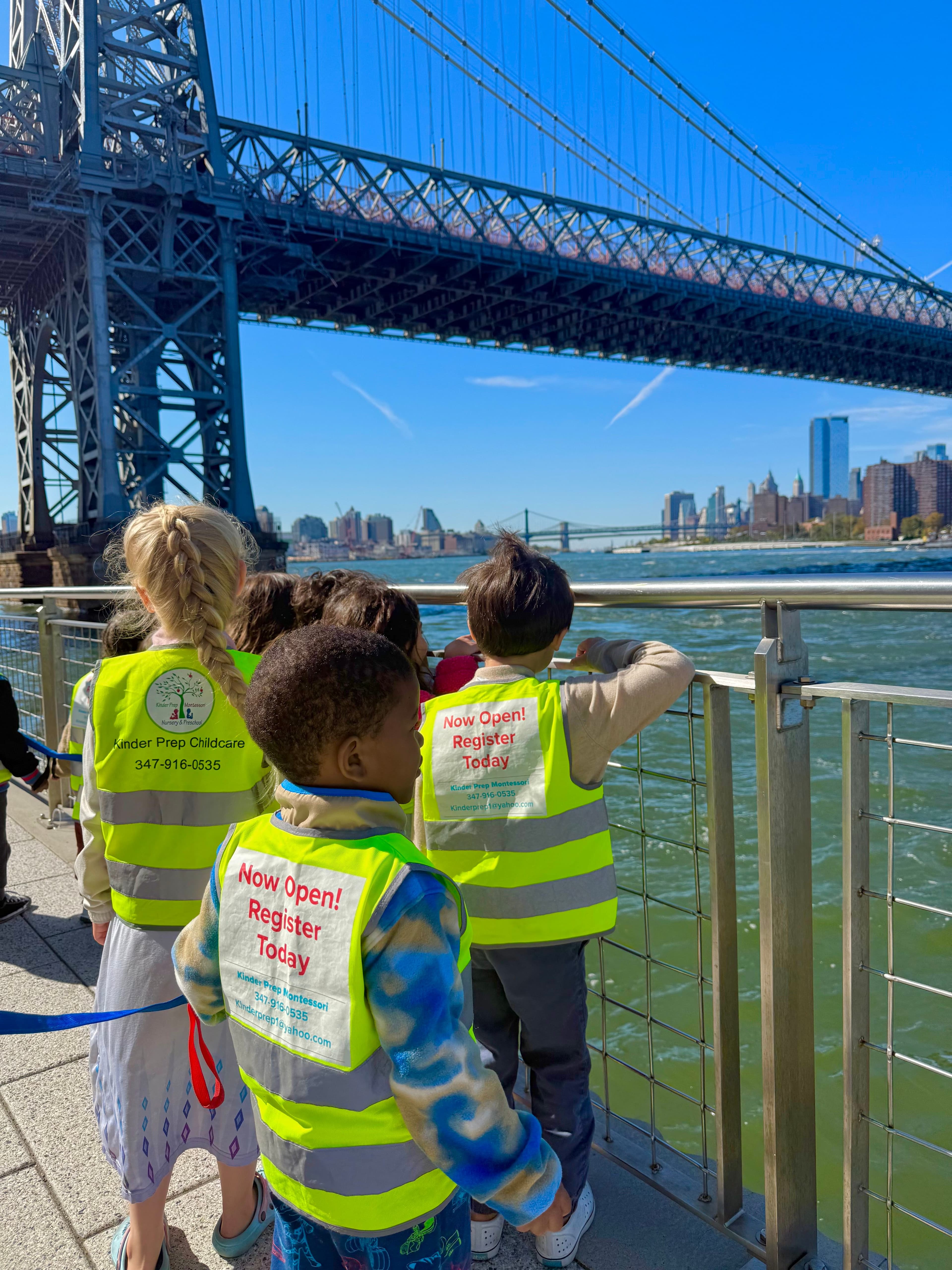 Children looking out over the river beneath the bridge