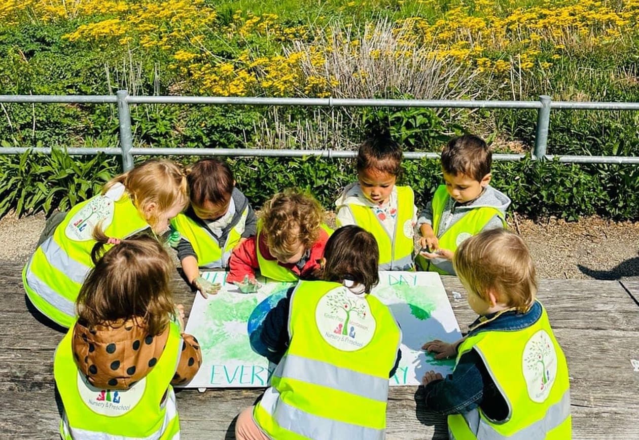 Children enjoying outdoor Earth Day activities