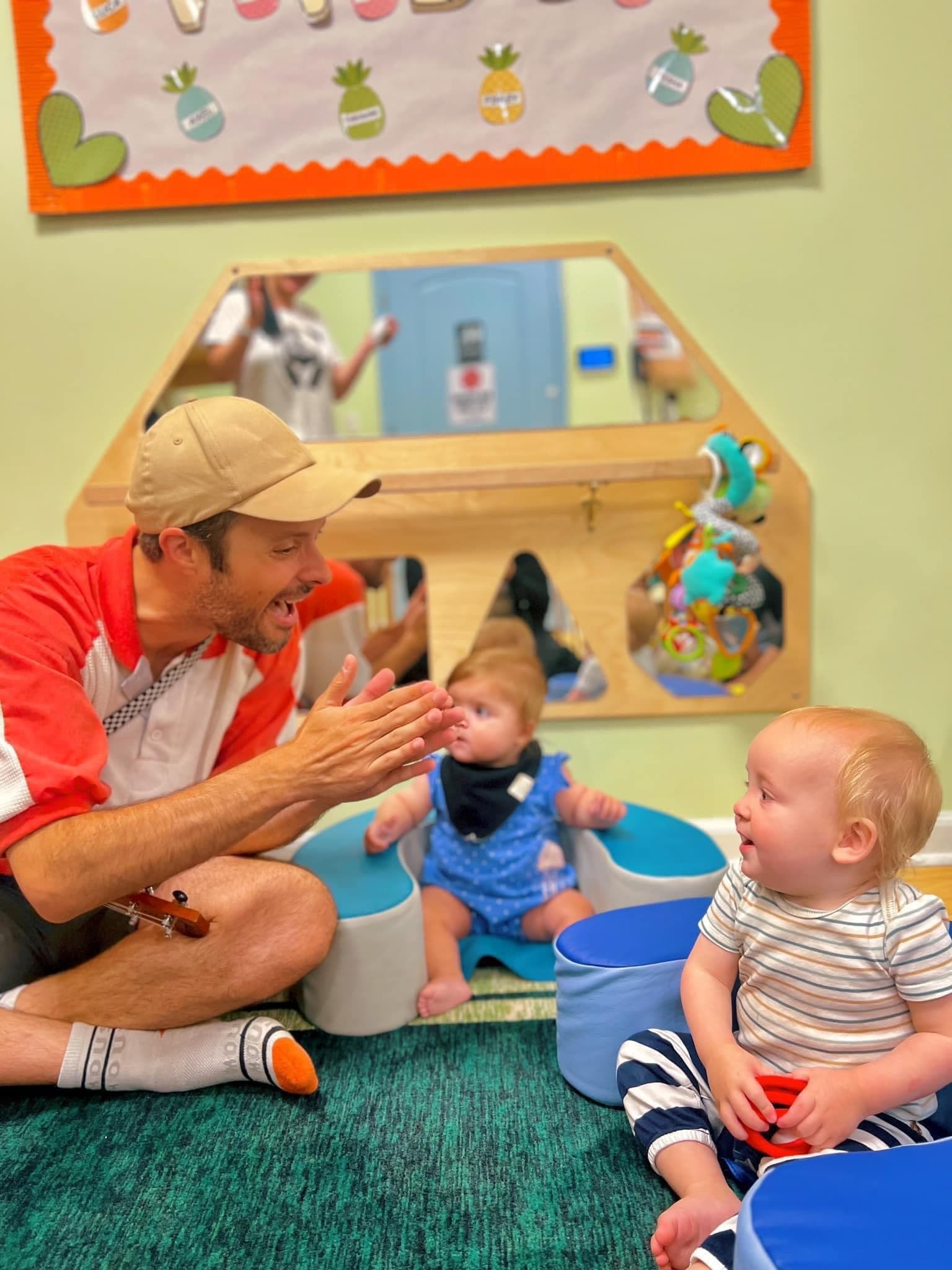 Children engaged in Music & Sign Language at Kinder Prep